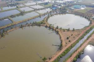 Aerial view from flying drone of Fish pond, fish farm photo