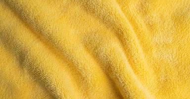 Fondo de textura de tela amarilla, abstracto, primer plano de la textura de la tela foto