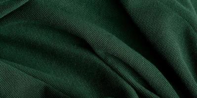 Green fabric texture background photo