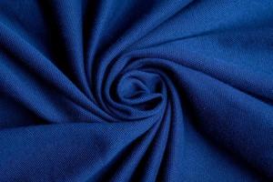 Blue fabric texture background, abstract, closeup texture of cloth photo