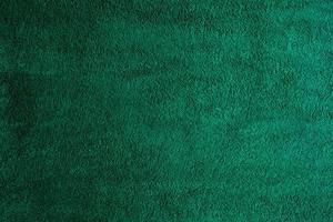 Green fabric texture background, abstract, closeup texture of cloth photo