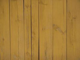 Vertical wooden boards gray on the wall as a background texture photo