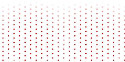 Light orange vector background with spots.