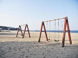 Swings on the beach of Yangyang city, South Korea photo