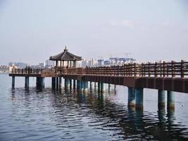 Korean traditional pavilion on the big pier. Sokcho city, South Korea photo