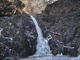 Frozen waterfall in the mountains, Seoraksan National Park, South Korea photo