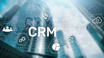 CRM, Customer relationship management system concept on abstract blurred background. photo
