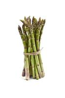 Bunch of fresh raw garden asparagus isolated on white background. Green spring vegetables. photo