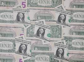 Fondo para temas de economía y finanzas con dinero en dólares estadounidenses foto
