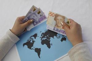 business travel planning with swedish money photo