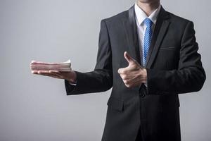 Business man holding China money photo