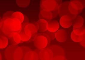 red bokeh lights background vector