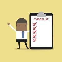 African businessman completing a checklist ticking al the boxes. vector