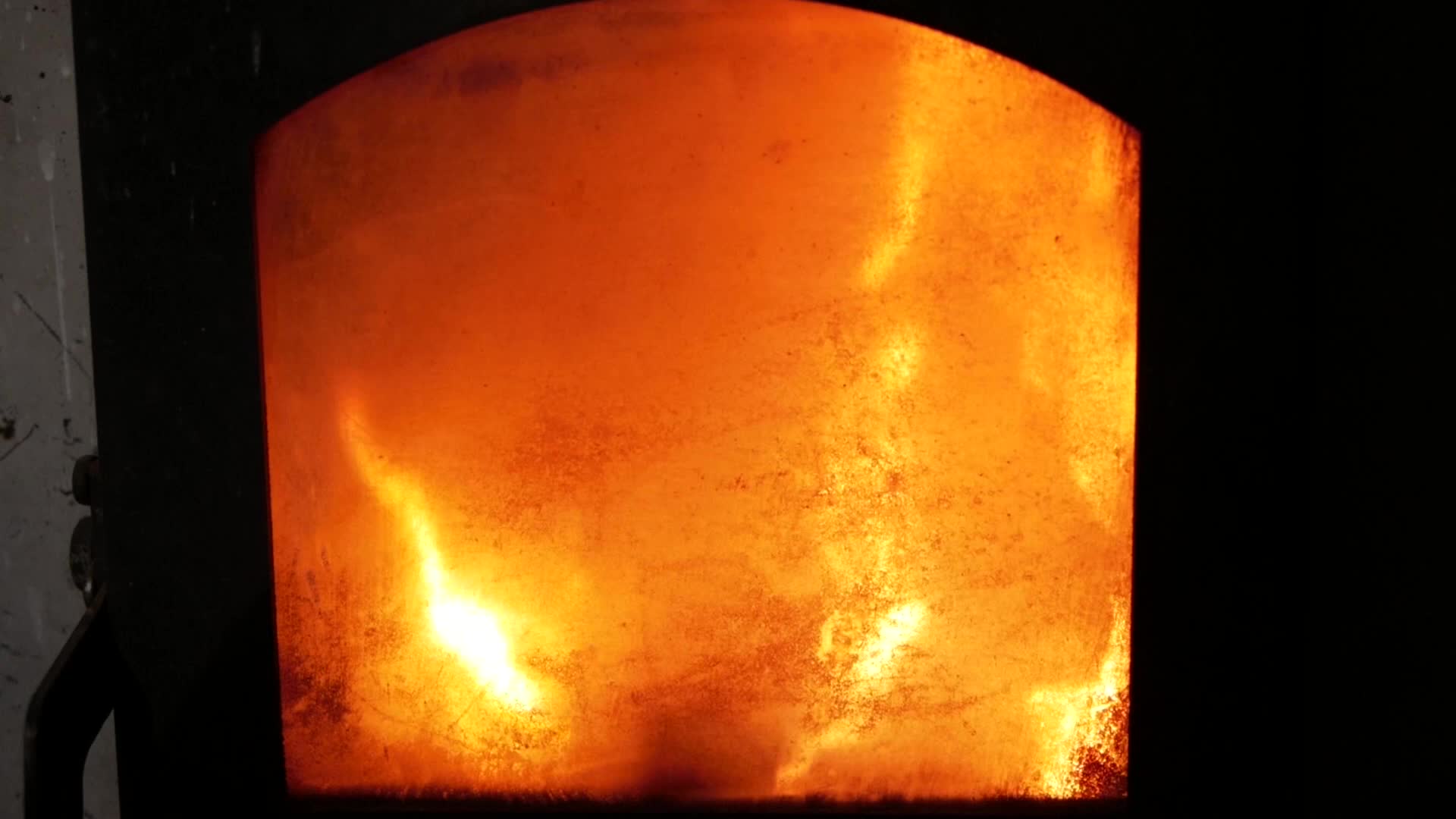 Fire is beautifully lit in a cast iron stove 2758878 Stock Video at