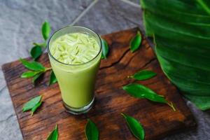 Iced greentea  and Fresh tea leaves for health photo