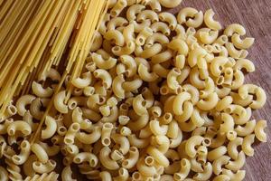 Phillips' raw pasta on a wooden background photo