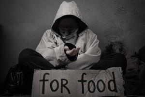 Homeless person asks for help with food photo