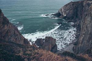 Cliff and beach in the coast in Bilbao Spain travel destinations photo