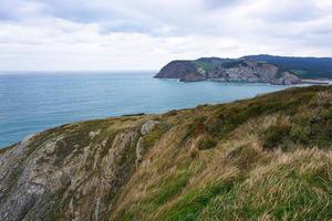 Cliff and beach in the coast in Bilbao Spain travel destinations photo