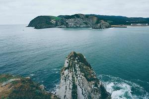 Cliff and beach in the coast in Bilbao Spain travel destinations photo