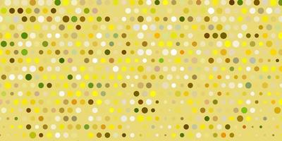 Light green, yellow vector backdrop with dots.