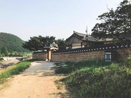 Old Asian house in a traditional village, South Korea photo