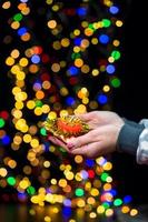 Woman holding Christmas decoration photo