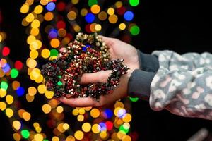 Woman holding Christmas decoration photo