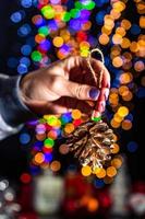 Hand holding Christmas decoration photo