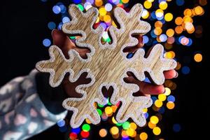 Hand holding Christmas decoration photo