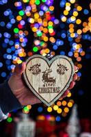 Hand holding Christmas decoration photo