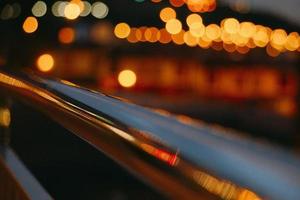 Christmas bokeh lights at night on the street photo