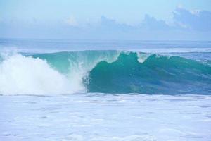 Waves on the blue sea in the coast photo