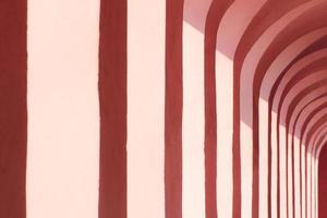 Pink columns of a building in the town of Imperia photo