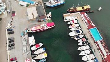 Dock for yachts and ships at sea Aerial shot video