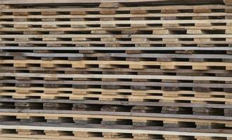 Stack of wood used in the transport warehouse photo