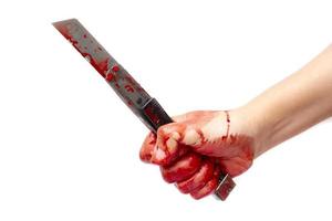 Cutter knife bloody in hand lady on white background photo