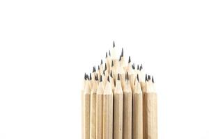 Wooden pencils on white background. photo