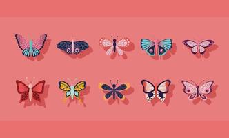 conjunto de mariposas sobre un fondo rosa vector