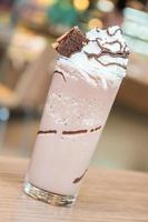 Chocolate smoothie on table photo