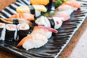 Sushi in black plate photo