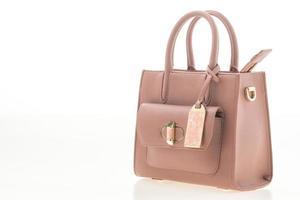 Pink handbags on white photo