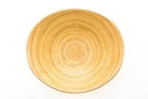 Wooden bowl on white photo