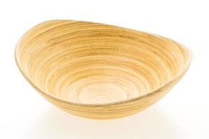 Wooden bowl on white photo