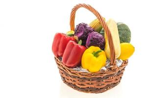 Vegetable basket on white photo