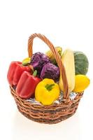 Vegetable basket on white photo