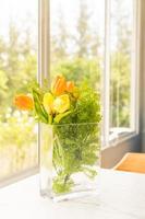 Plastic or fake flower in vase photo