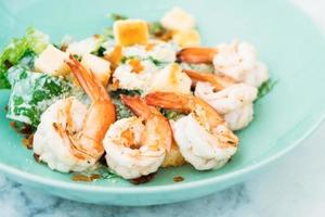 Caesar salad with shrimp or prawn photo