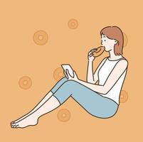 A girl is eating a donut while looking at her phone. hand drawn style vector design illustrations.