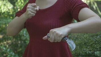 Karambit knife in lady hand tactical fighter photo